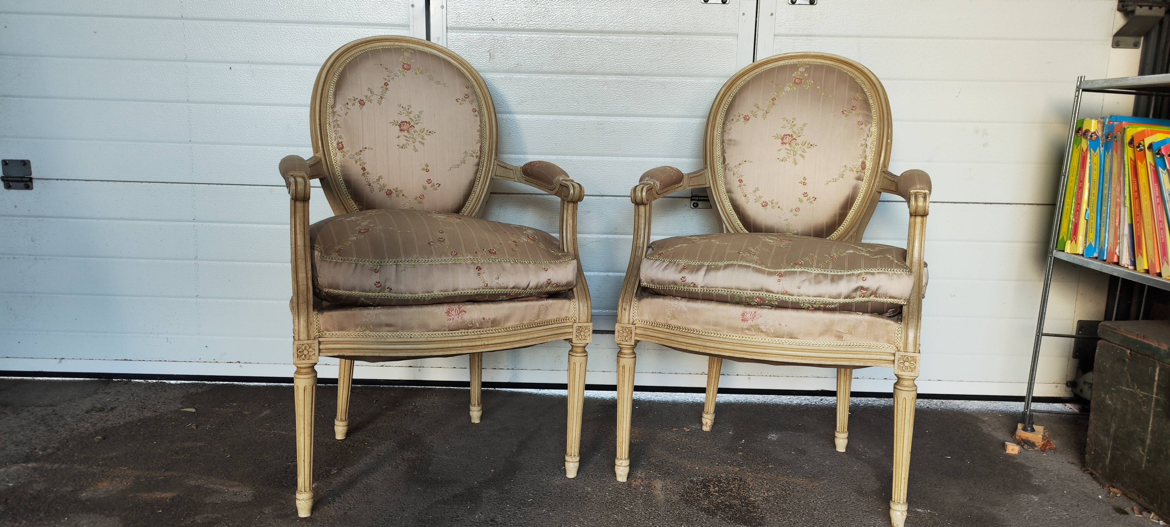 Old pair of Louis XVI style armchairs