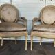 Old pair of Louis XVI style armchairs