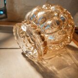 Tulip in iridescent golden glass