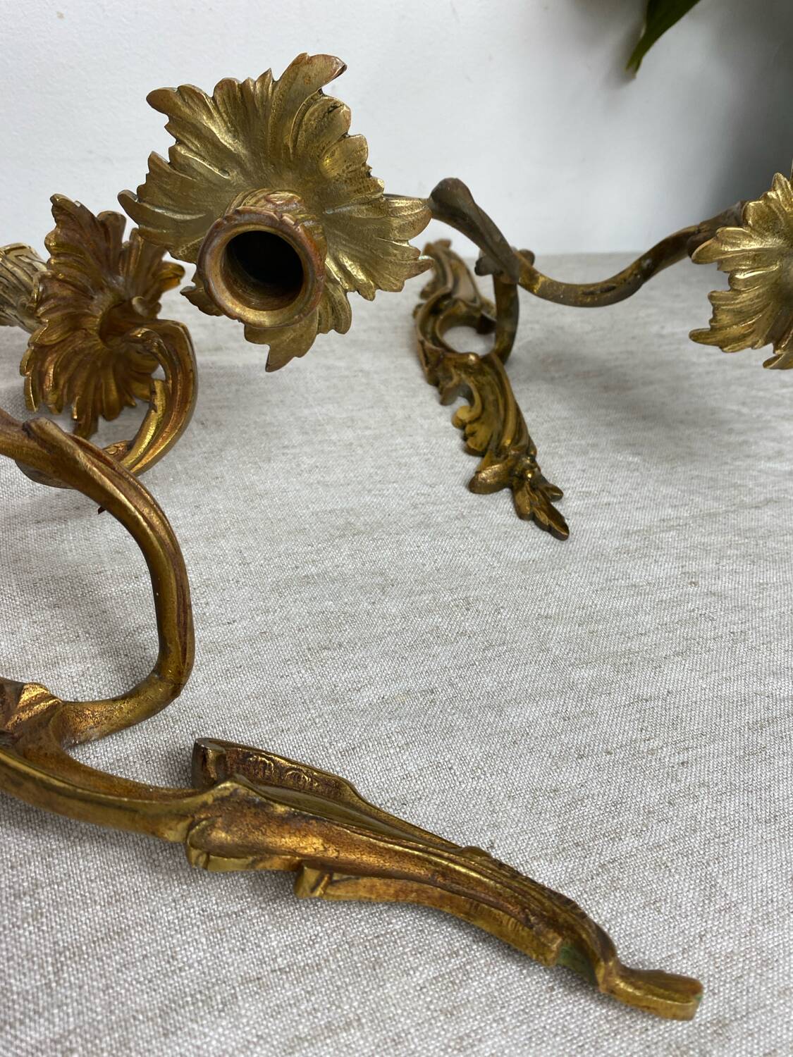 Two Louis XV style bronze wall candlesticks