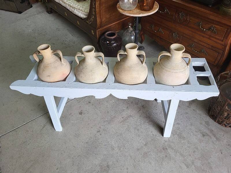 Antique painted wooden jar holder with 4 earthenware jars