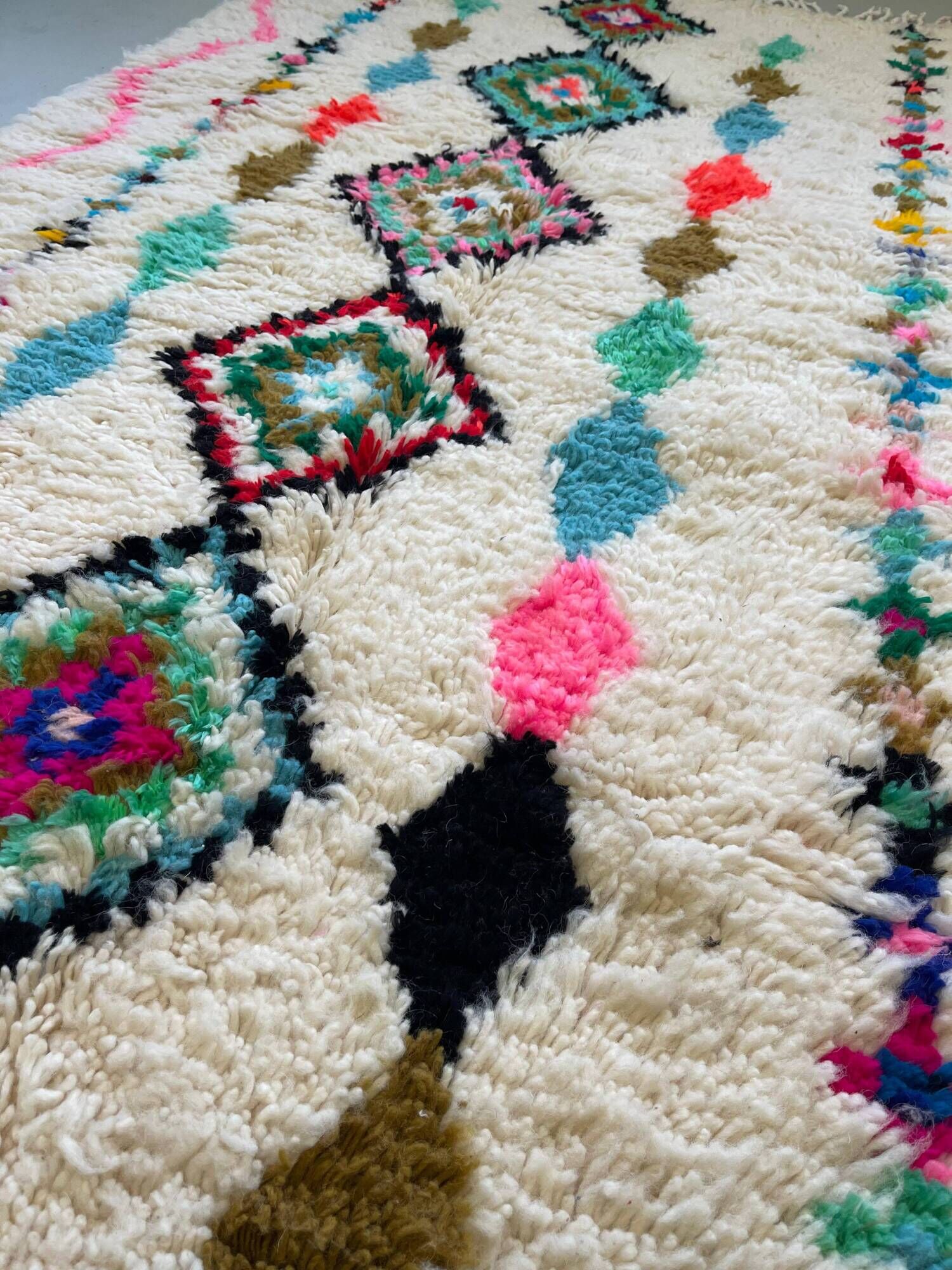 Moroccan Berber rug in ecru with multicoloured diamonds and bright pink – 240 × 139