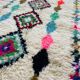 Moroccan Berber rug in ecru with multicoloured diamonds and bright pink – 240 × 139
