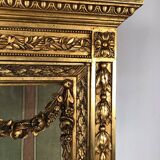 Louis XVI style showcase in wood and gilded stucco, circa 1900
