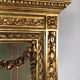 Louis XVI style showcase in wood and gilded stucco, circa 1900