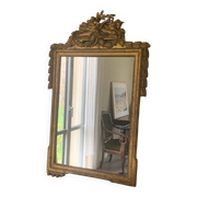 Mirror with a golden frame