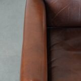 Sheepskin art deco design armchair with timeless and warm colours