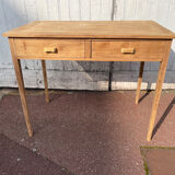 Vintage wooden desk with two drawers.