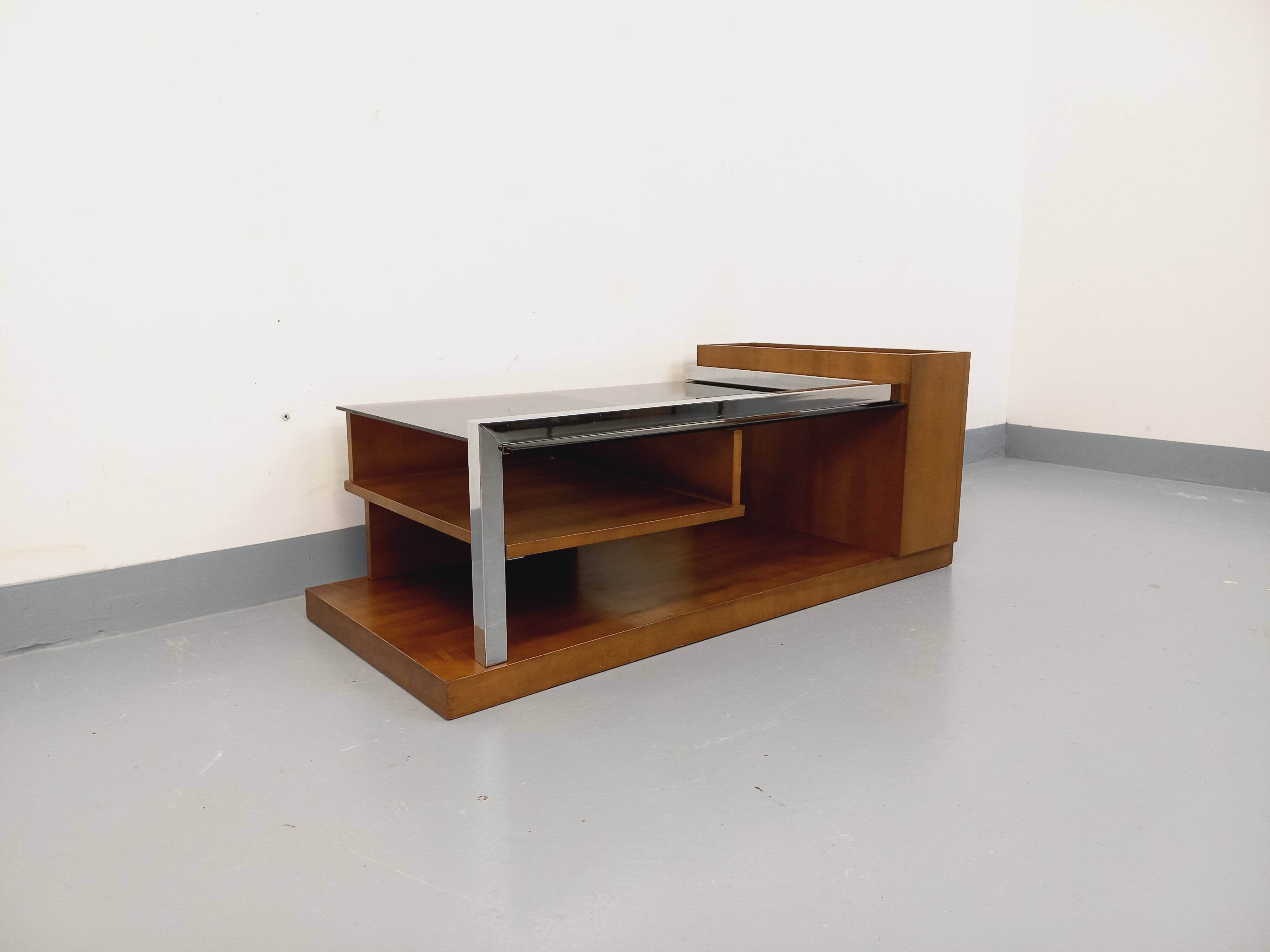 Rectangular vintage modernist coffee table with wooden niches, chrome.