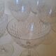 9 crystal water glasses from Baccarat Magenta Grain De Riz, height 15.5 cm.