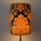 Fabric lampshade with baroque pattern, antique gold leaf design.