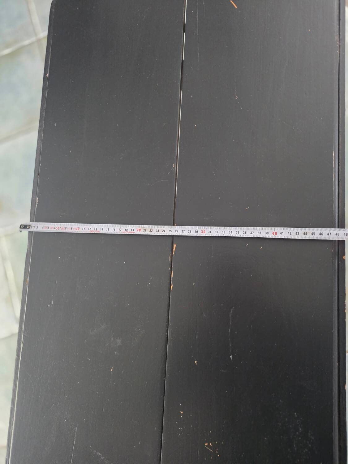 Oval gateleg table from the late 19th century, repainted in black.