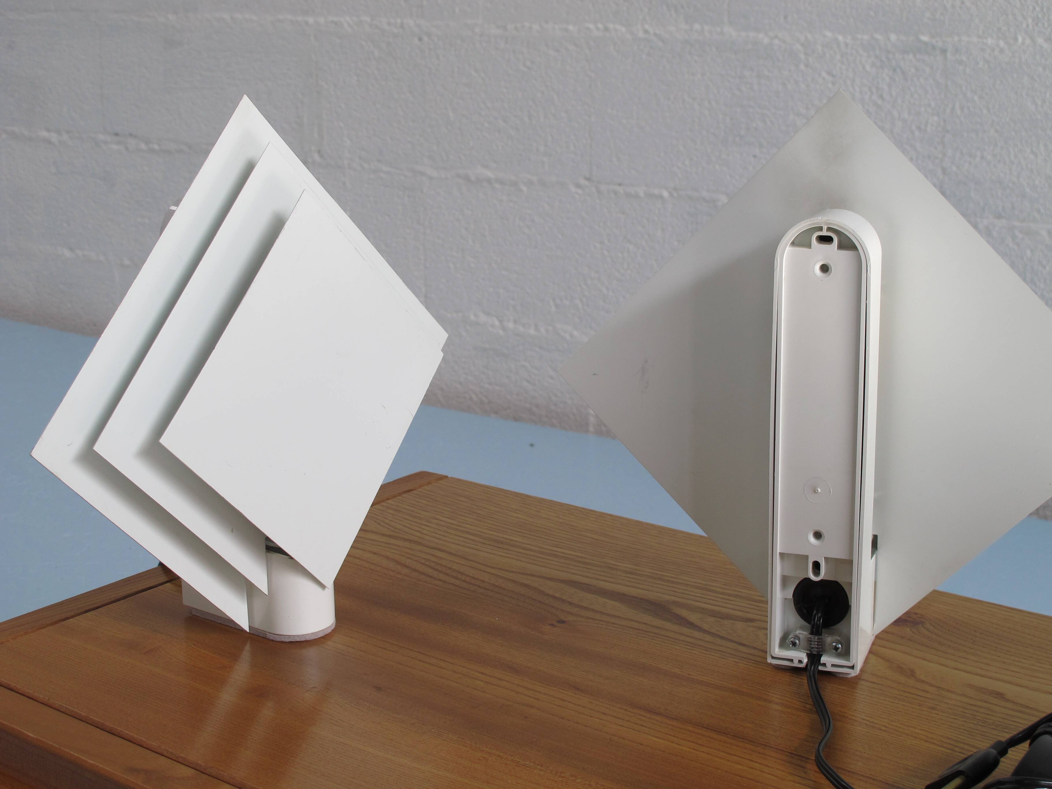 Pair of Lumiance bedside lamps or wall lights in lacquered sheet metal