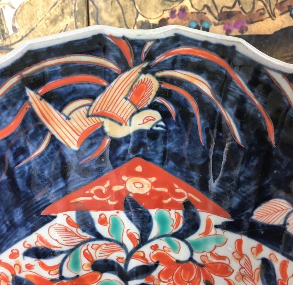 Imari porcelain dish from Japan in the shape of a scallop shell Blue, red and turquoise