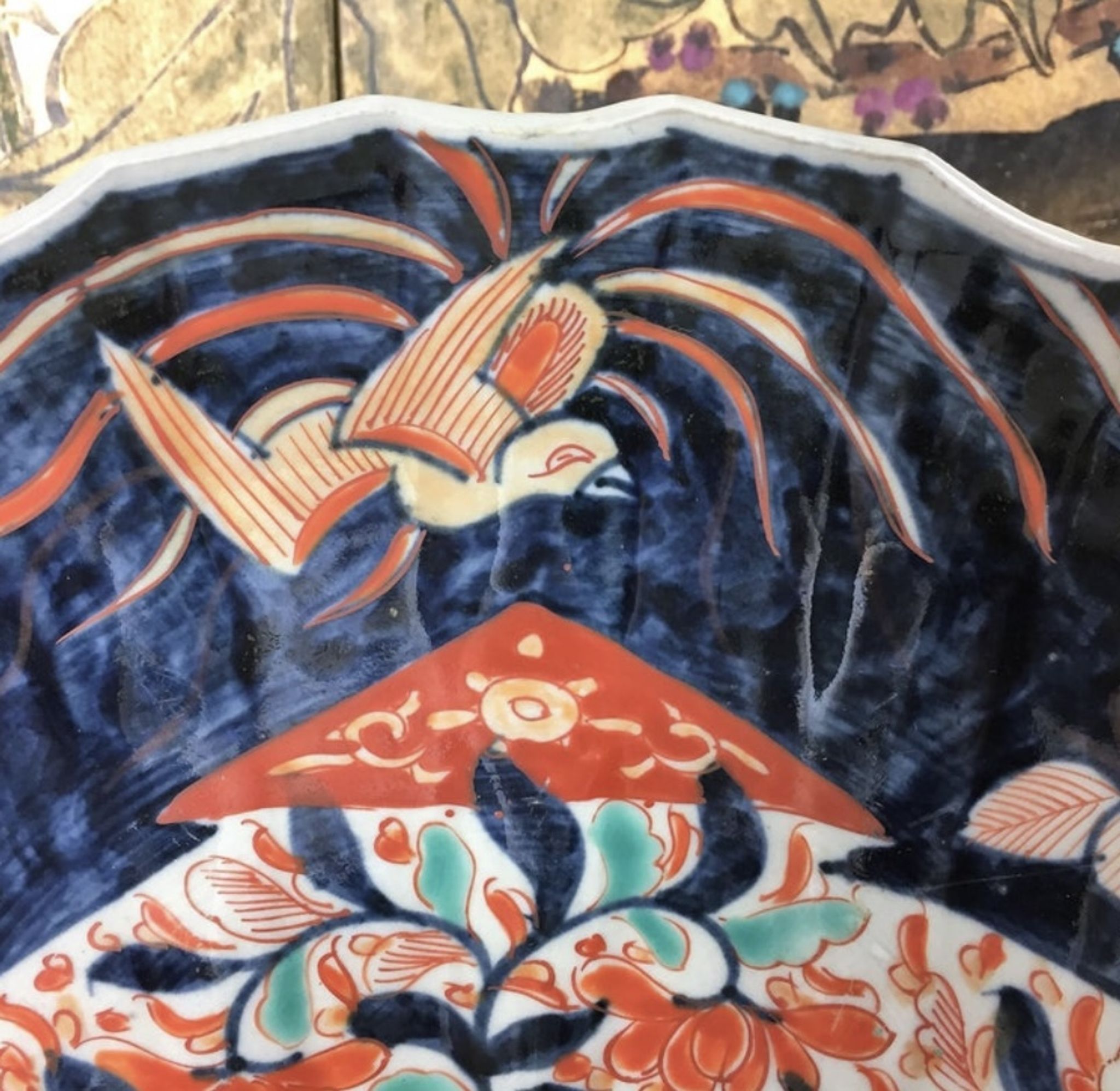 Imari porcelain dish from Japan in the shape of a scallop shell Blue, red and turquoise