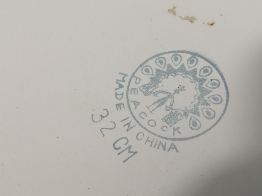 Peacock enamelled metal basin decoration