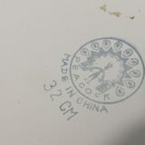 Peacock enamelled metal basin decoration