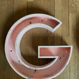 Lettres d'enseigne en métal rose "god" ou "dog"