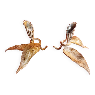 Pair of patina metal candle holders