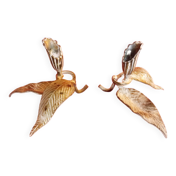 Pair of patina metal candle holders