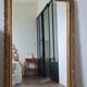 Antique Louis Philippe mirror with a pediment.