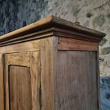 Antique French wardrobe in oak and pine, late 19th century.