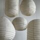 Small Japanese-style natural rattan and linen pendant light in the shape of a drop H40 D35