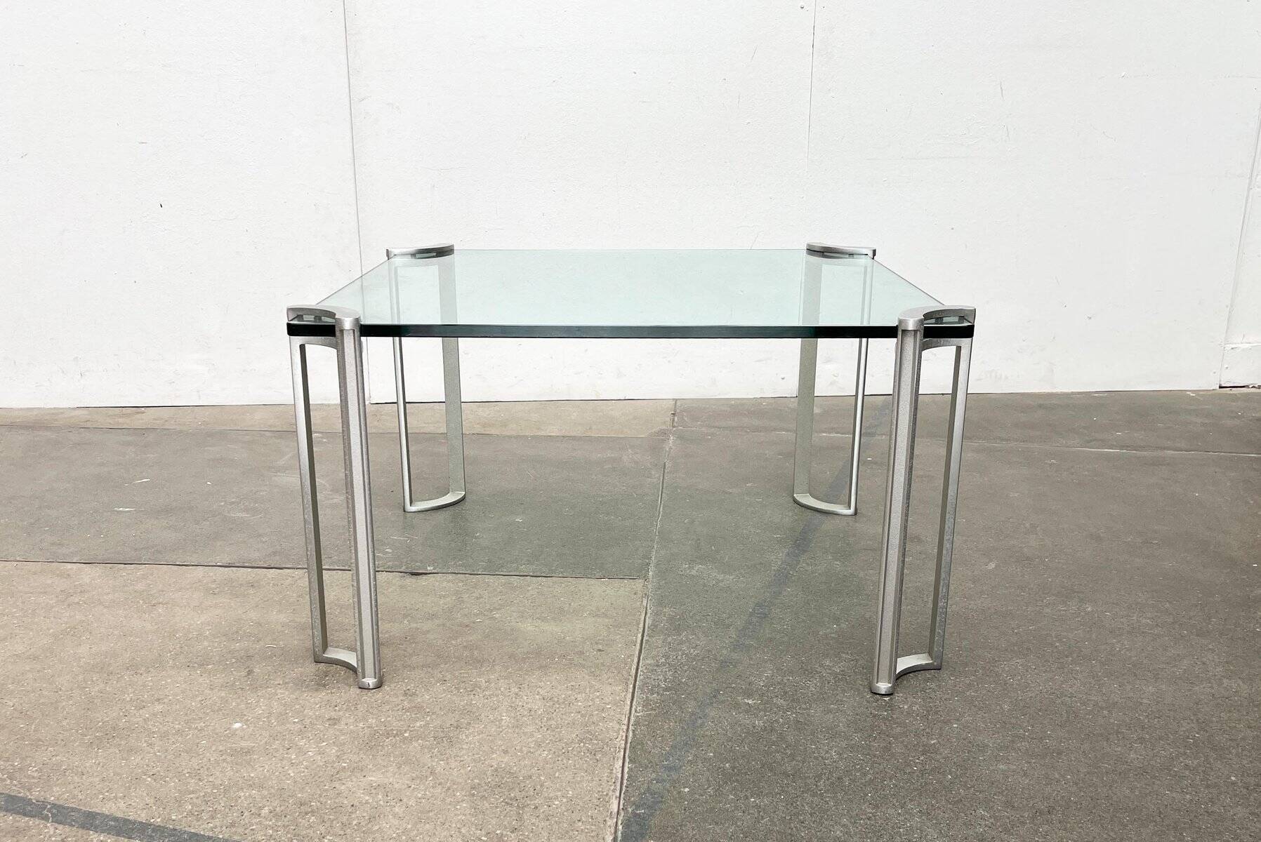 Vintage Space Age coffee table in glass and aluminium attributed to Peter Ghyczy, 1970s.