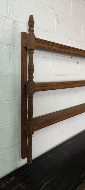 Old oak shelf back of glass counter wall