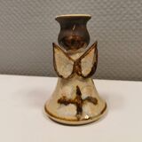 Ceramic candle holder, in the shape of an angel, signed at the bottom.