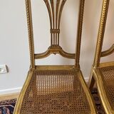 Pair of Louis XVI style fluted gilded chairs