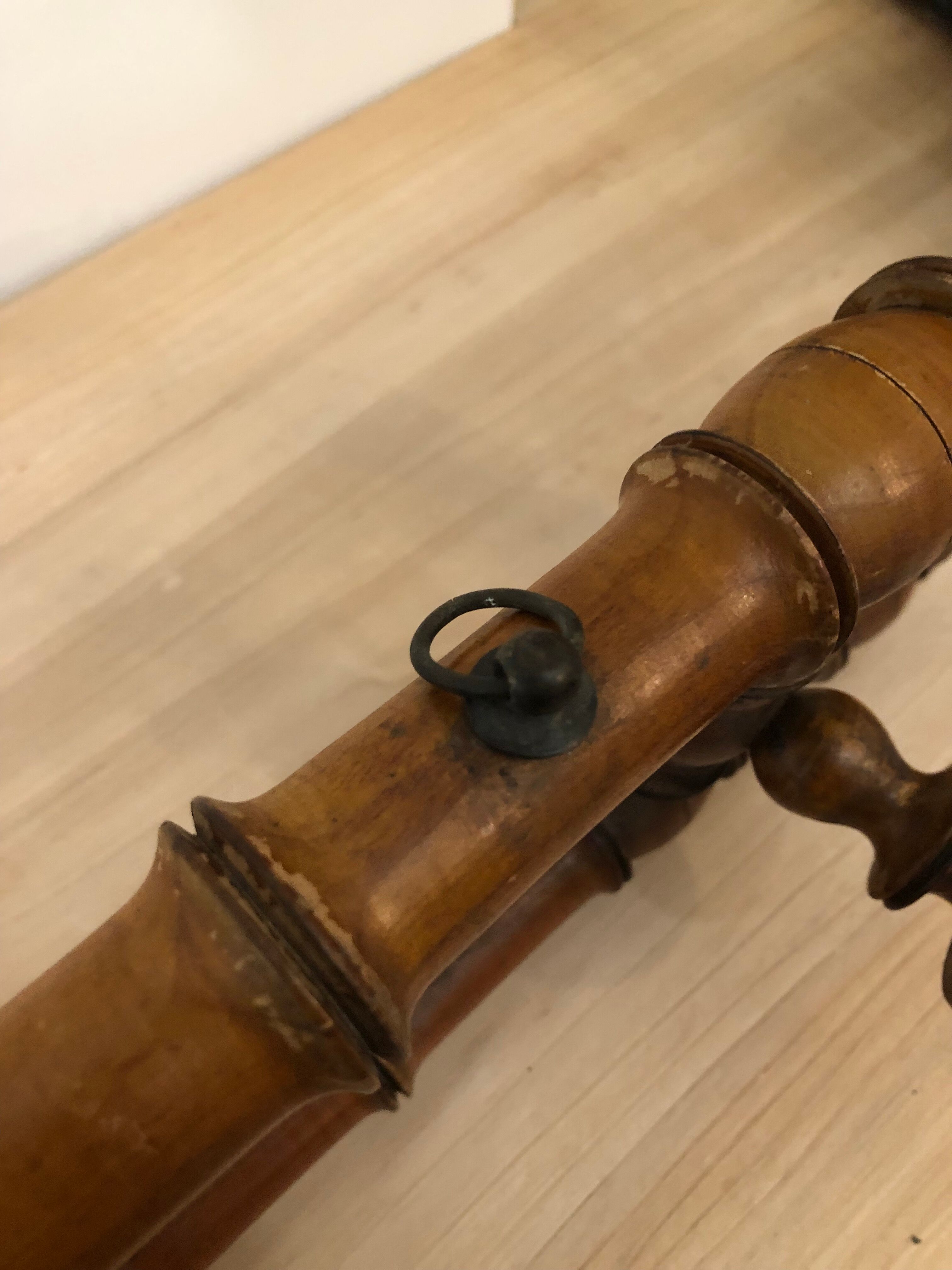 Wooden coat rack with swivel hooks