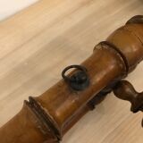 Wooden coat rack with swivel hooks
