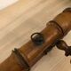 Wooden coat rack with swivel hooks