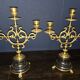 Elegant pair of three-light candelabra in gilded bronze.
