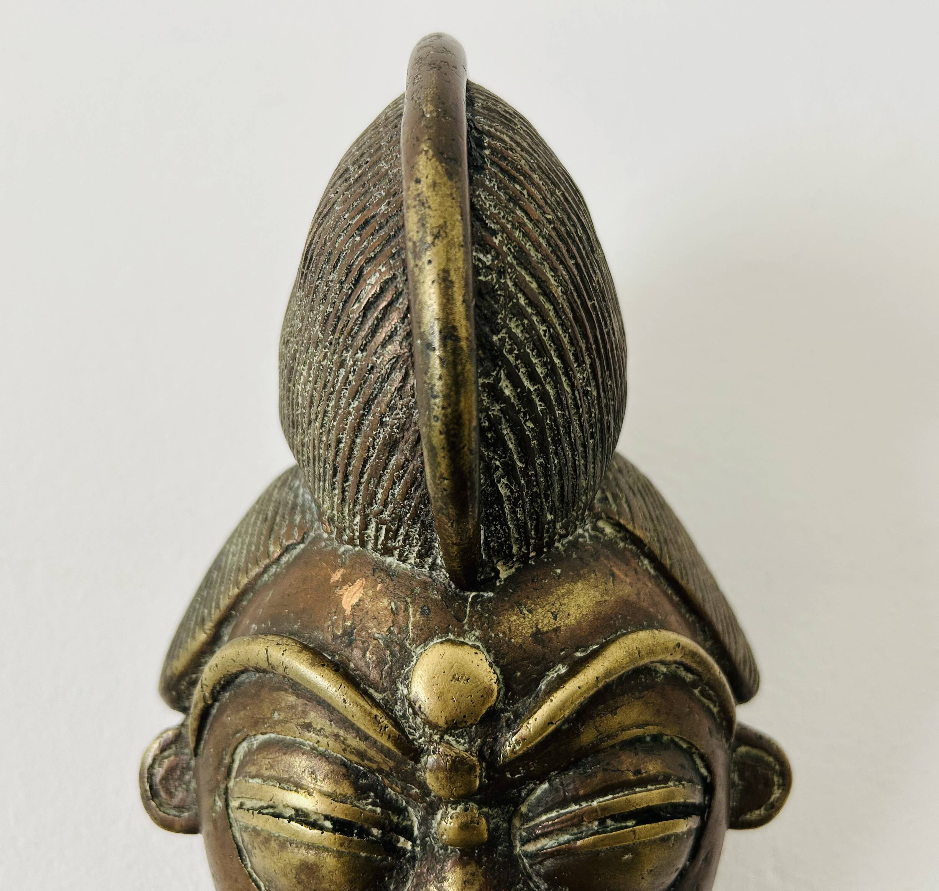 Masque en bronze africain, 19e siècle