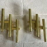 Tubular wall sconces in brass, Italian design from the 1970s, attributed.