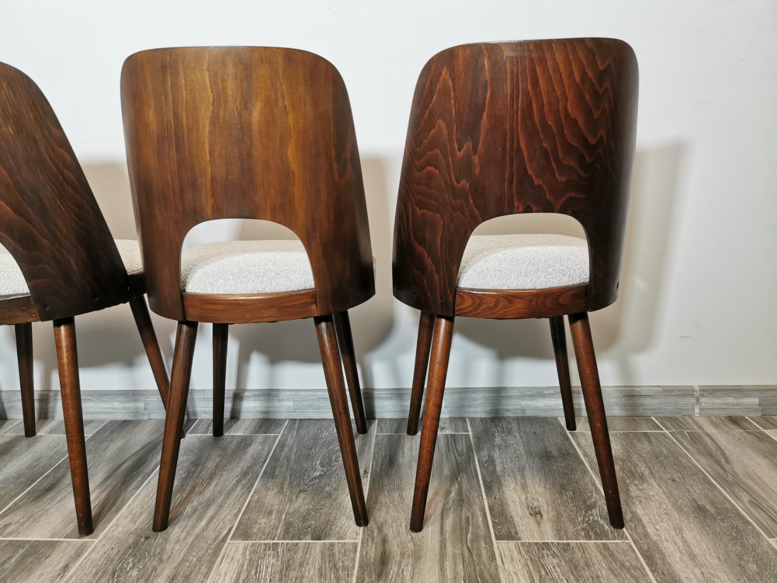 Dining chairs by Oswald Haerdtl