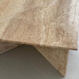 Pair of triangular travertine tables