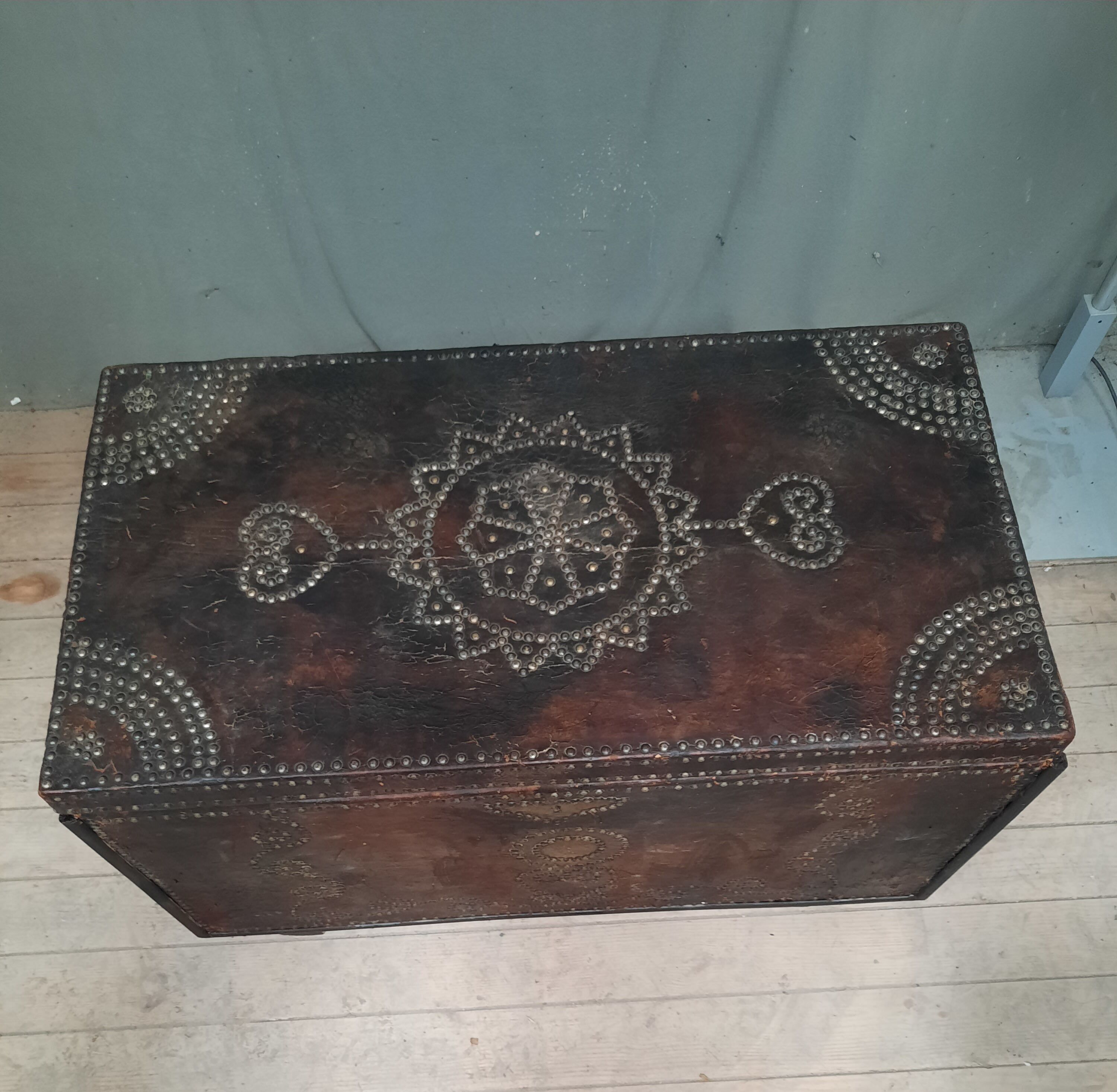 Chest covered with leather and nails