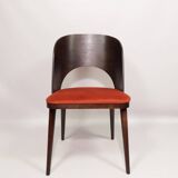 Scandinavian design orange papaya shell dining chairs