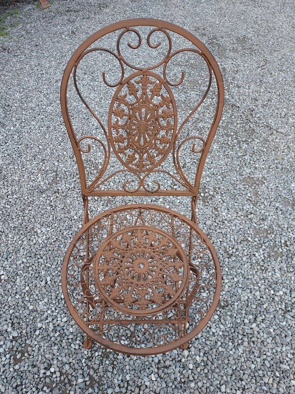 Garden furniture in brown patinated iron