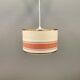 Hanging lamp with brass-coloured details, made of fabric with intact plastic bottom grille.