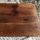Antique Louis Philippe style farm table in solid cherry wood with turned base.