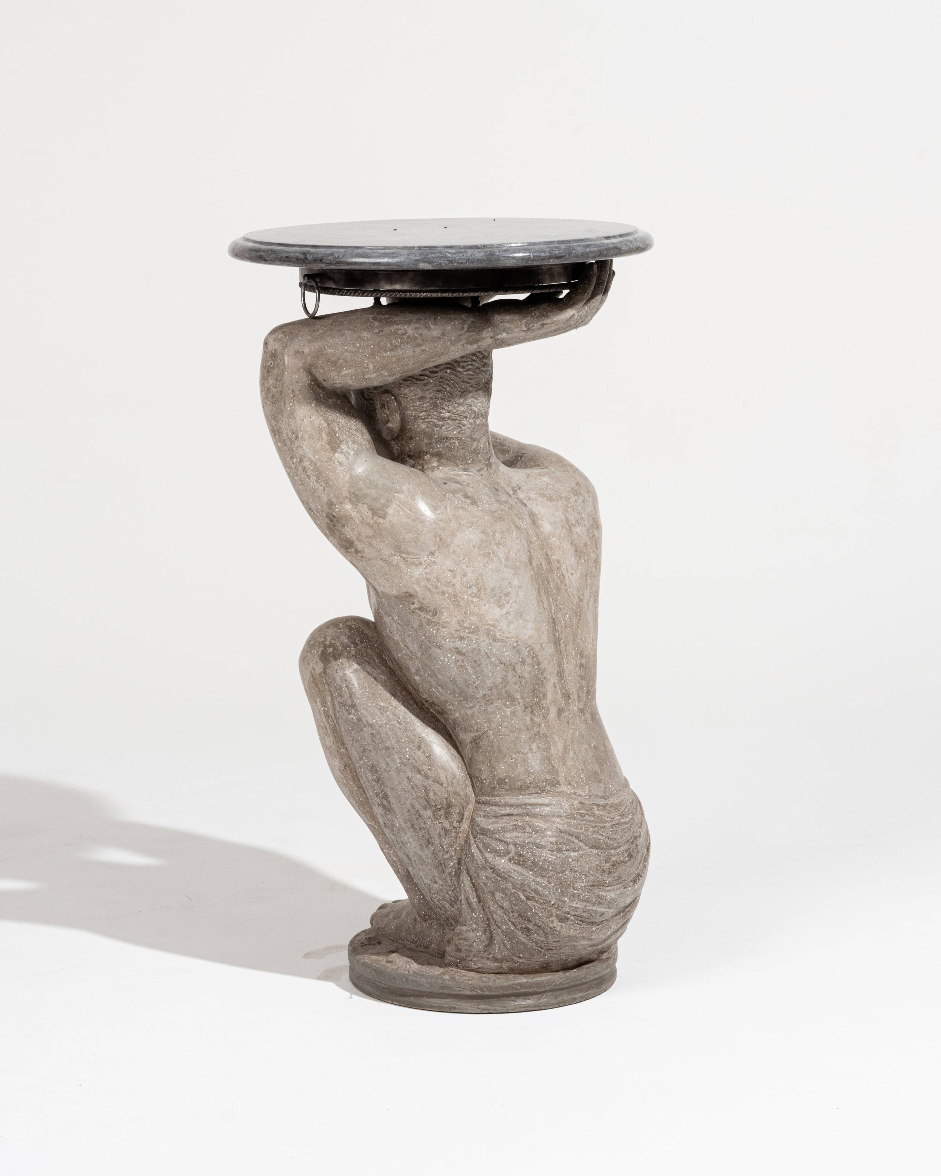 "Kneeling Strength" Pedestal Table