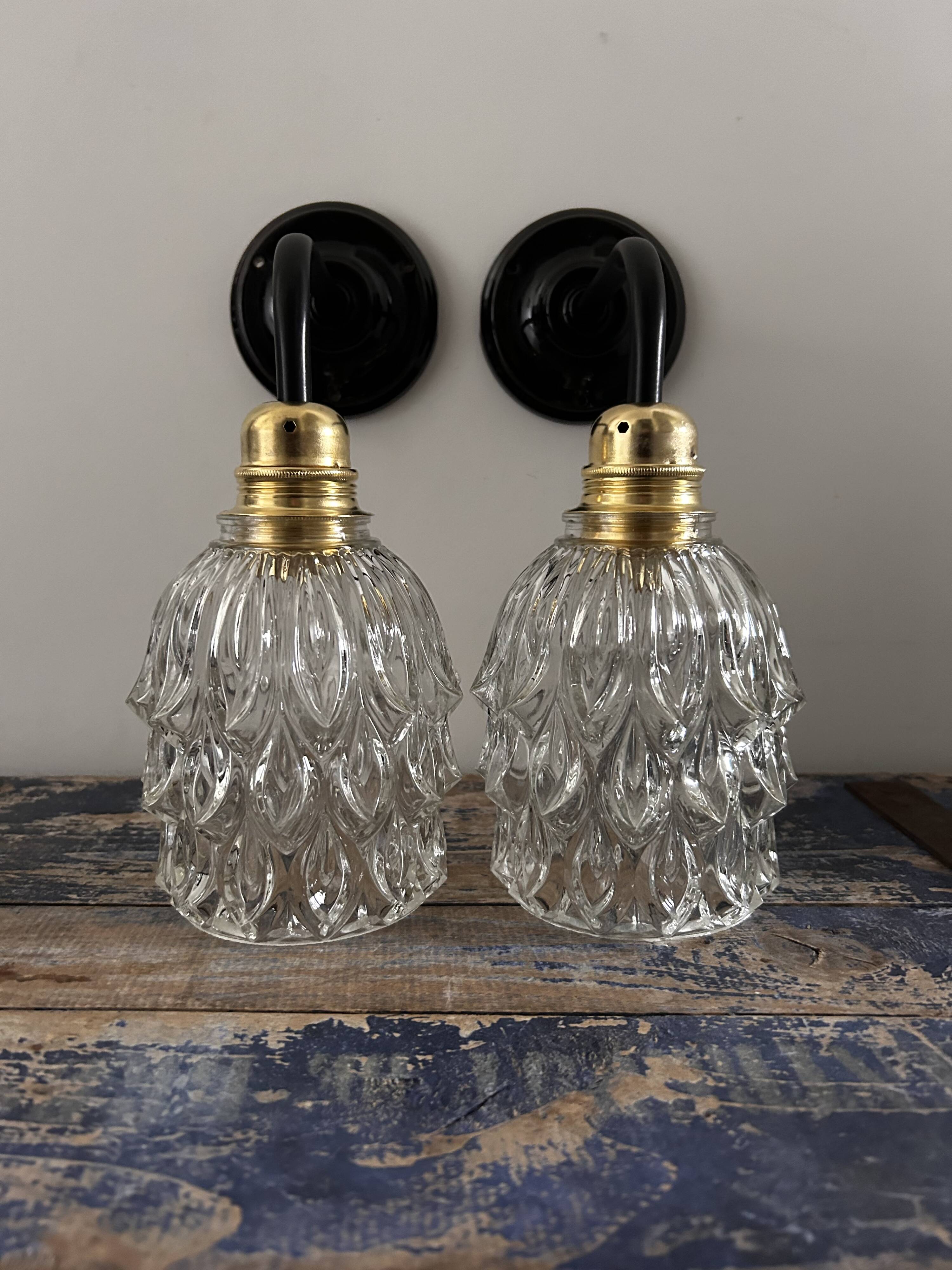 Pair of chiseled glass wall sconces