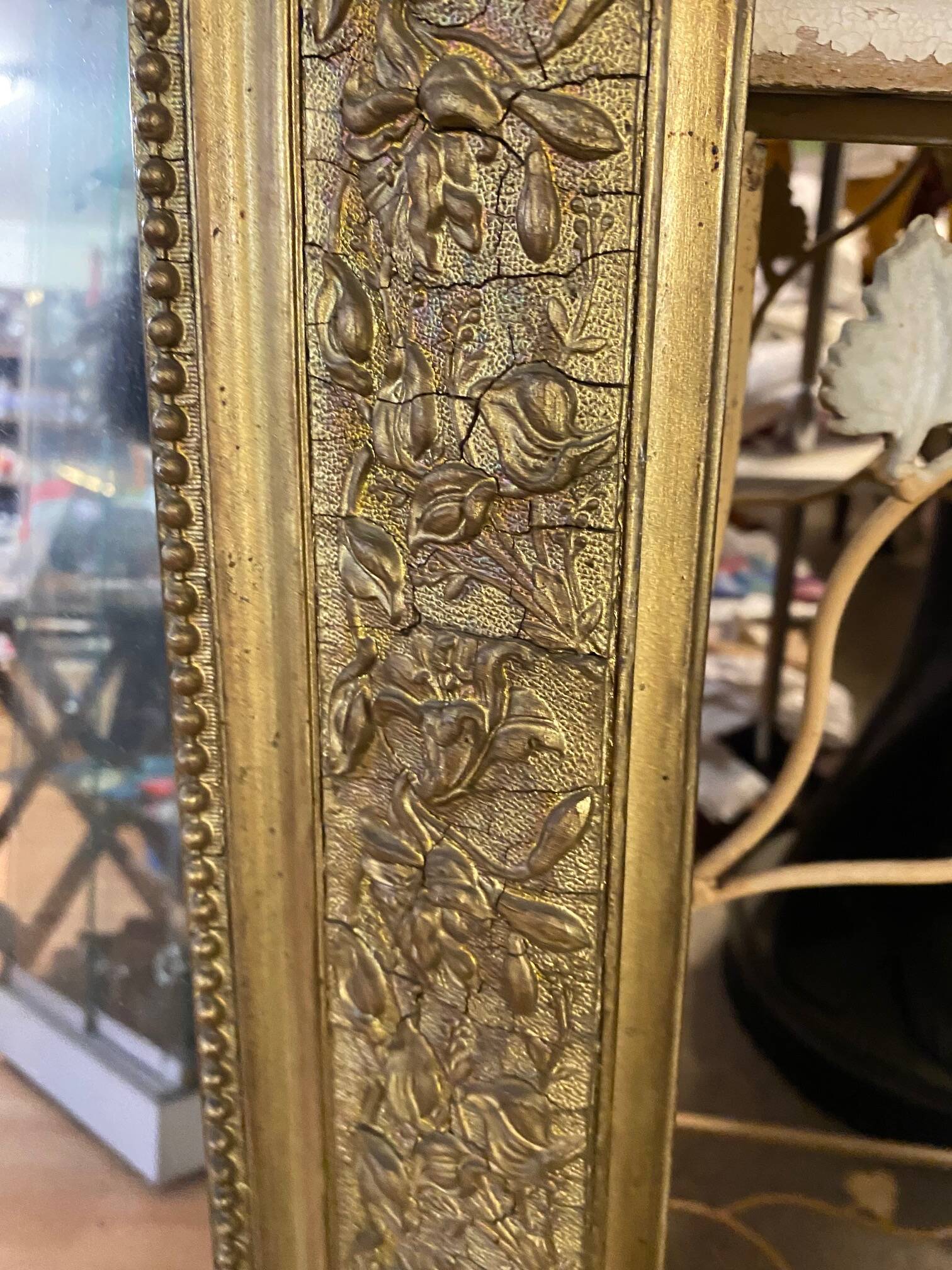 LARGE LOUIS XV STYLE ROCAILLE MIRROR IN GILT STUCCO FORAL DECOR ON PEDAL