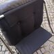 Tubular fireside chair in black skai and metal, design 1970