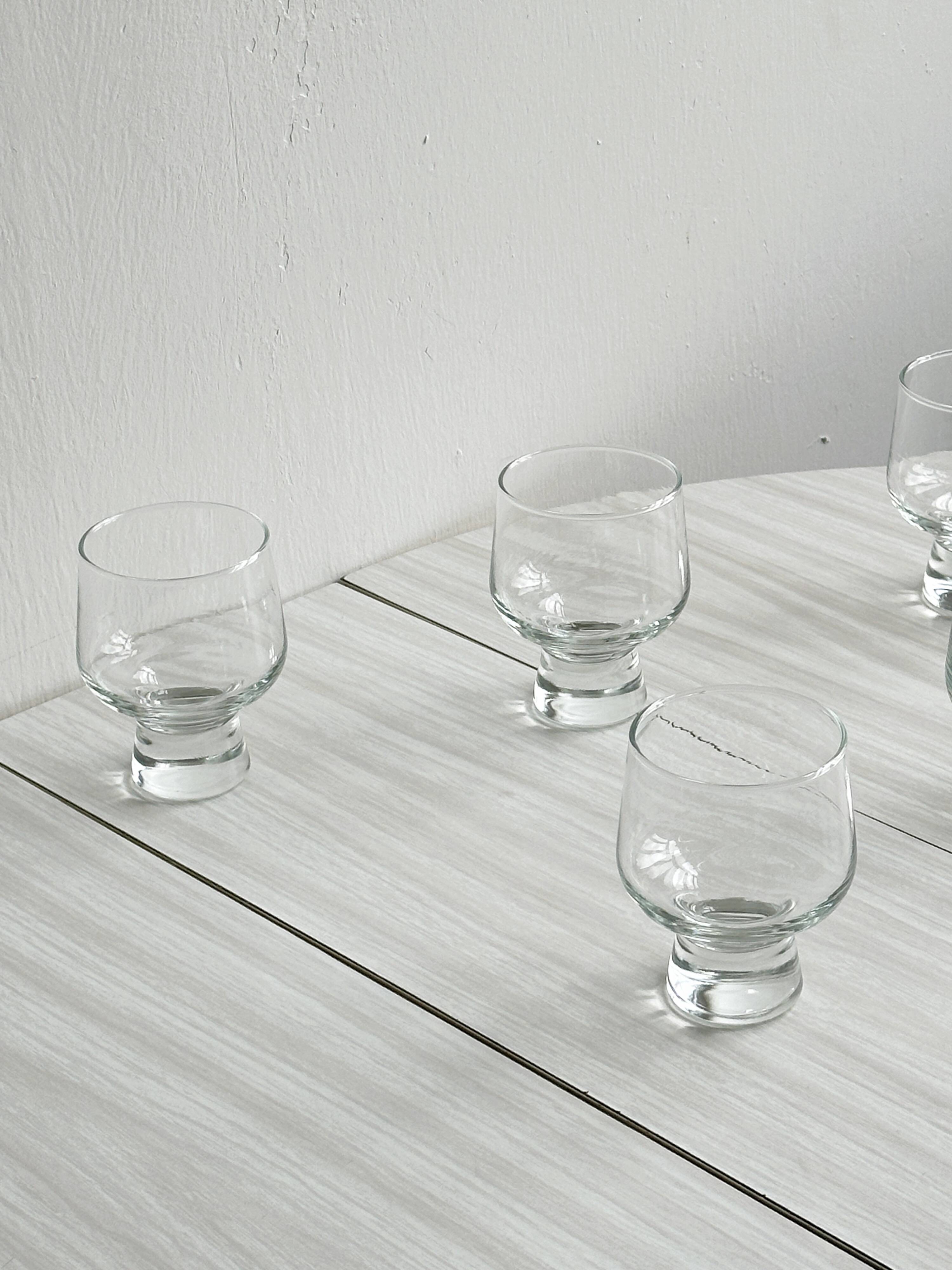 5 thick glass water glasses.