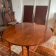 Solid mahogany dining table from the Louis XVI period, extendable.